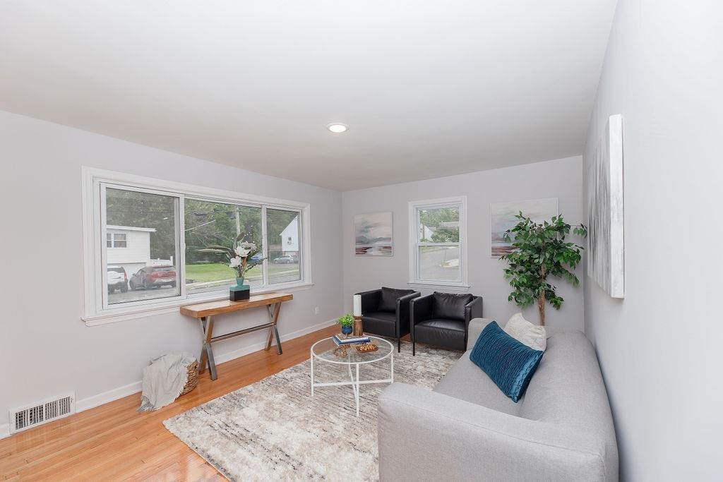 1072 Sayre Road South Union, NJ 07083 - Photo 5 of 31 a living room with furniture and a potted plant