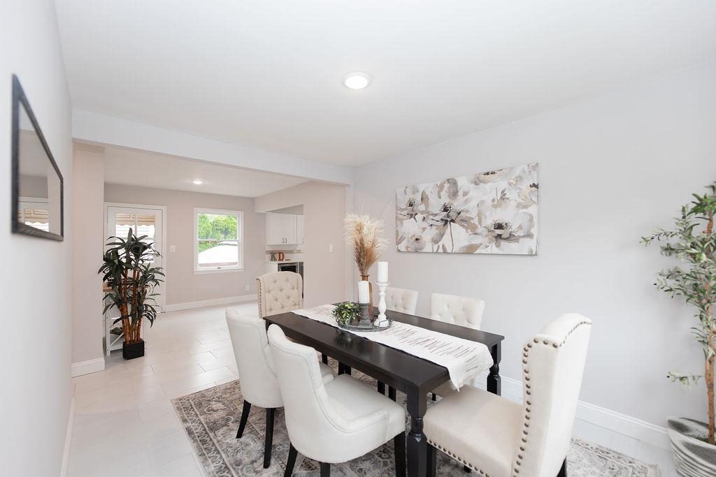 1072 Sayre Road South Union, NJ 07083 - Photo 7 of 31 a view of a dining room with furniture and wooden floor