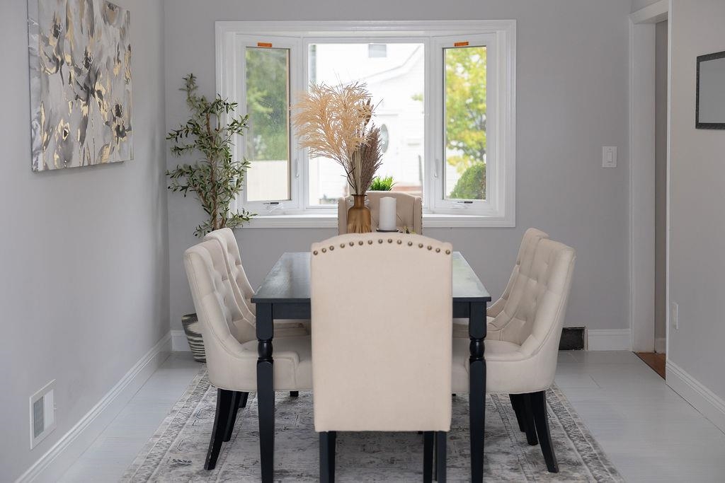 1072 Sayre Road South Union, NJ 07083 - Photo 8 of 31 a view of a dining room with furniture and window