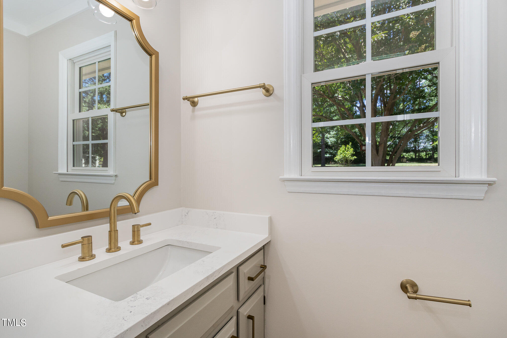 2008 Umstead Road Durham, NC 27712 - Photo 12 of 34 a bathroom with a sink and a window