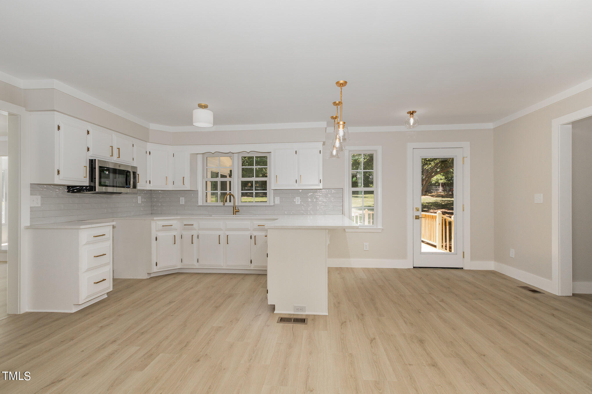 2008 Umstead Road Durham, NC 27712 - Photo 18 of 34 a kitchen with stainless steel appliances a refrigerator sink and cabinets