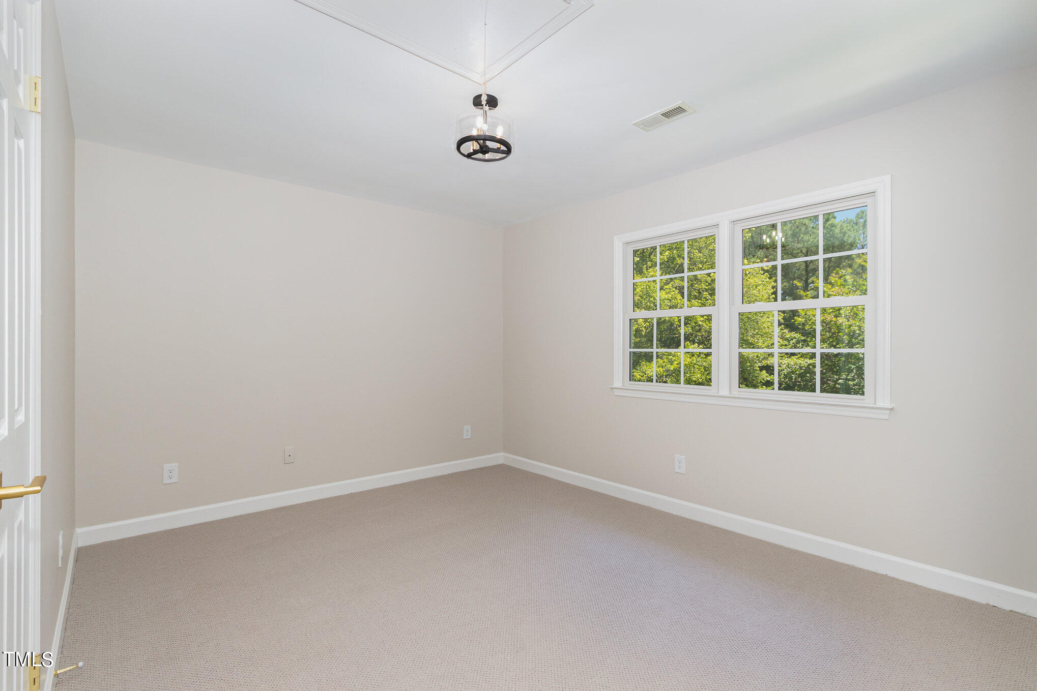 2008 Umstead Road Durham, NC 27712 - Photo 25 of 34 an empty room with a window