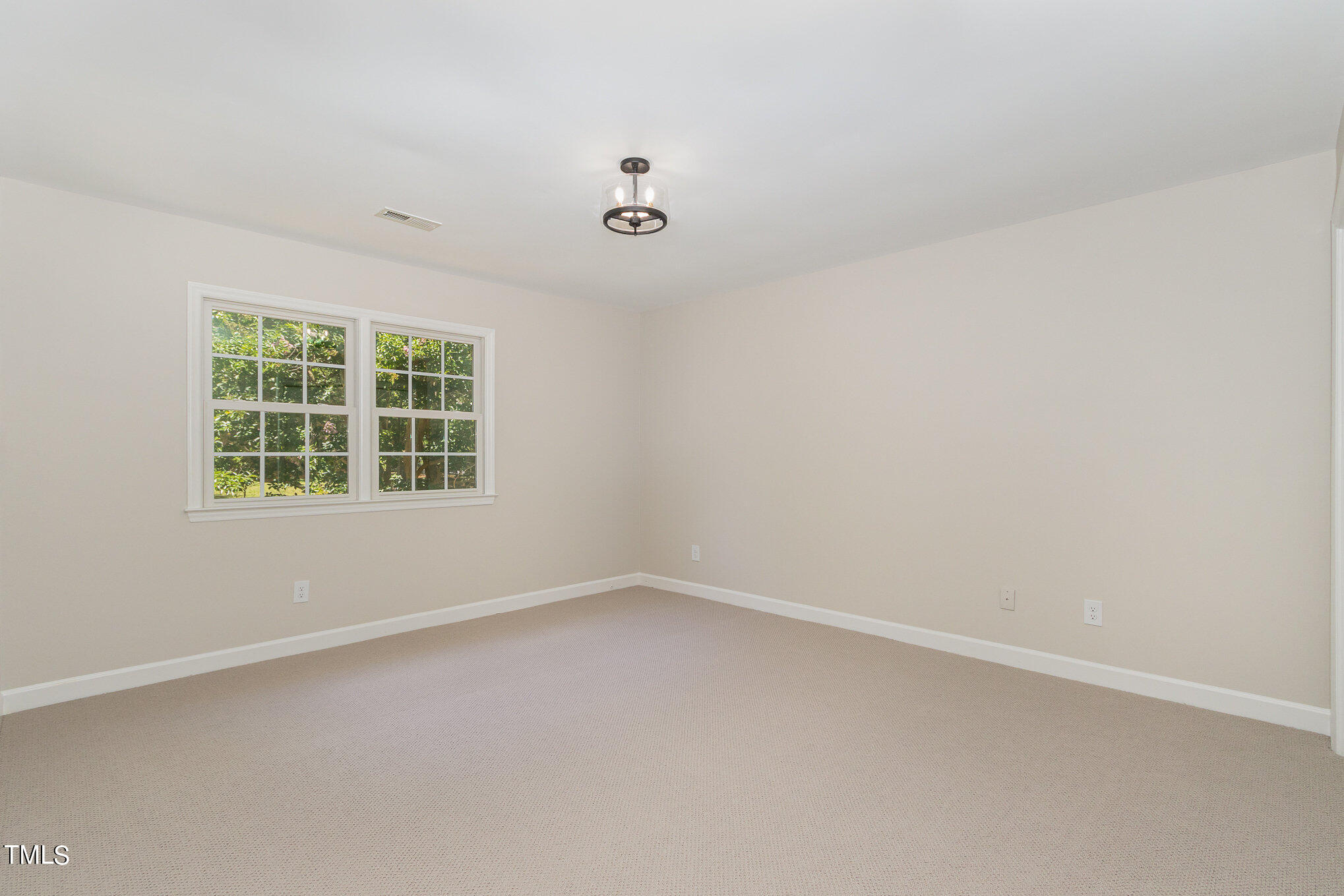 2008 Umstead Road Durham, NC 27712 - Photo 27 of 34 an empty room with windows