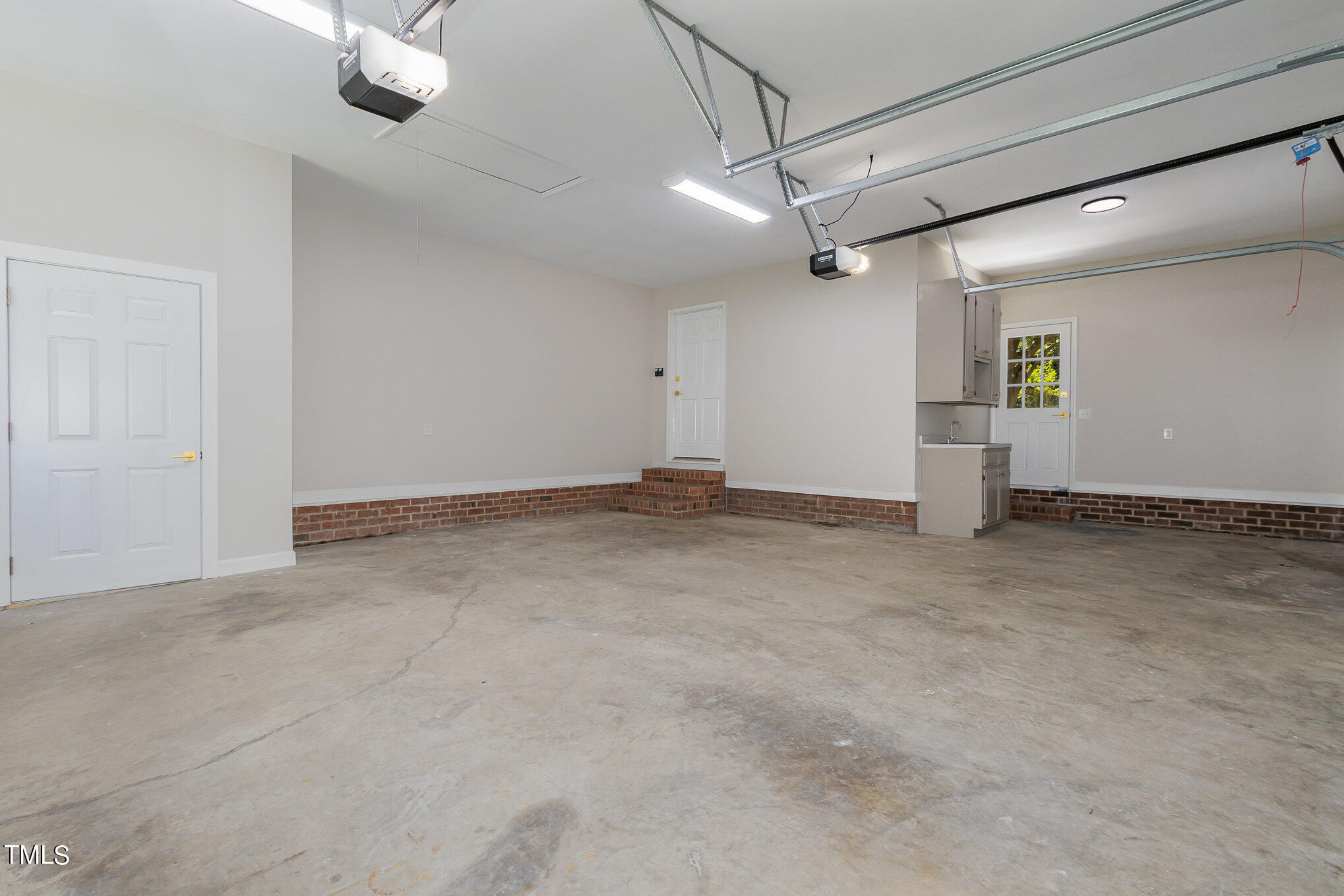 2008 Umstead Road Durham, NC 27712 - Photo 29 of 34 an empty room with a ceiling fan and window