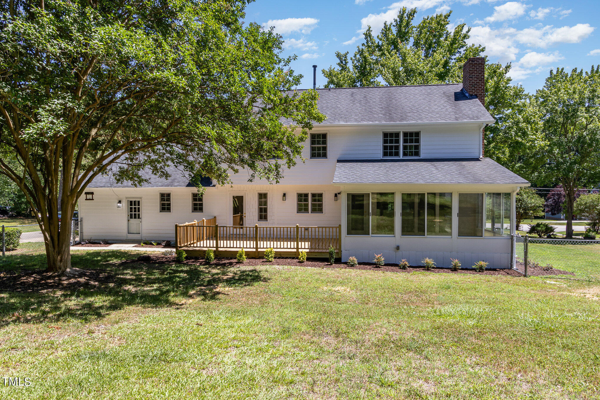2008 Umstead Road Durham, NC 27712 - Photo 30 of 34 a front view of a house with a yard covered with green space