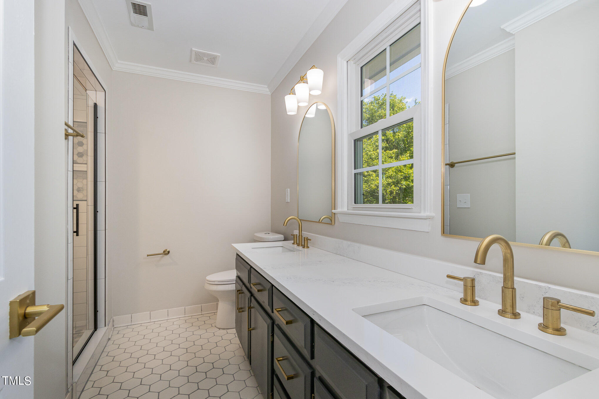 2008 Umstead Road Durham, NC 27712 - Photo 3 of 34 a bathroom with a sink and a mirror