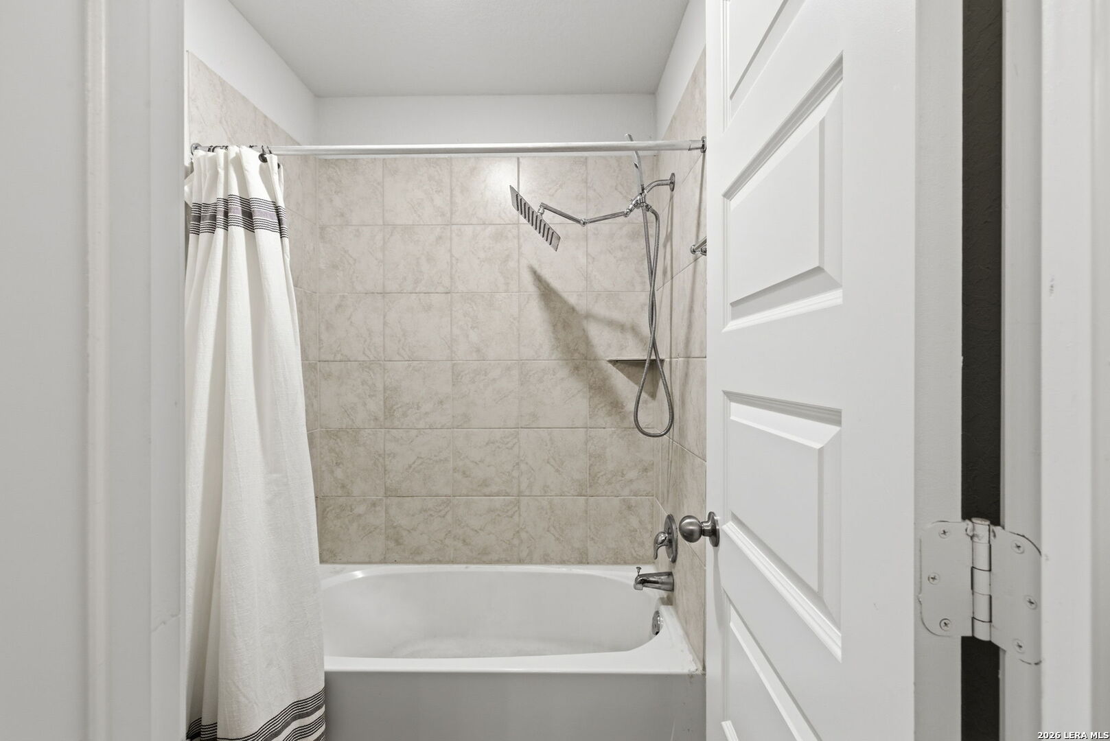 3410 Copper Acres Bulverde, TX 78163 - Photo 28 of 50 a bathroom with a bathtub and a shower