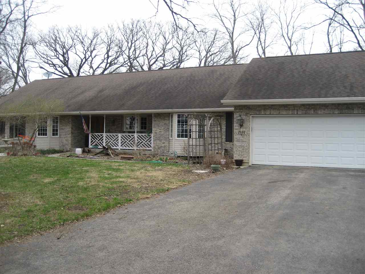 2401 South Watertown Road Oregon, IL 61061 - Photo 1 of 24 a backyard of a house with table and chairs and barbeque grill