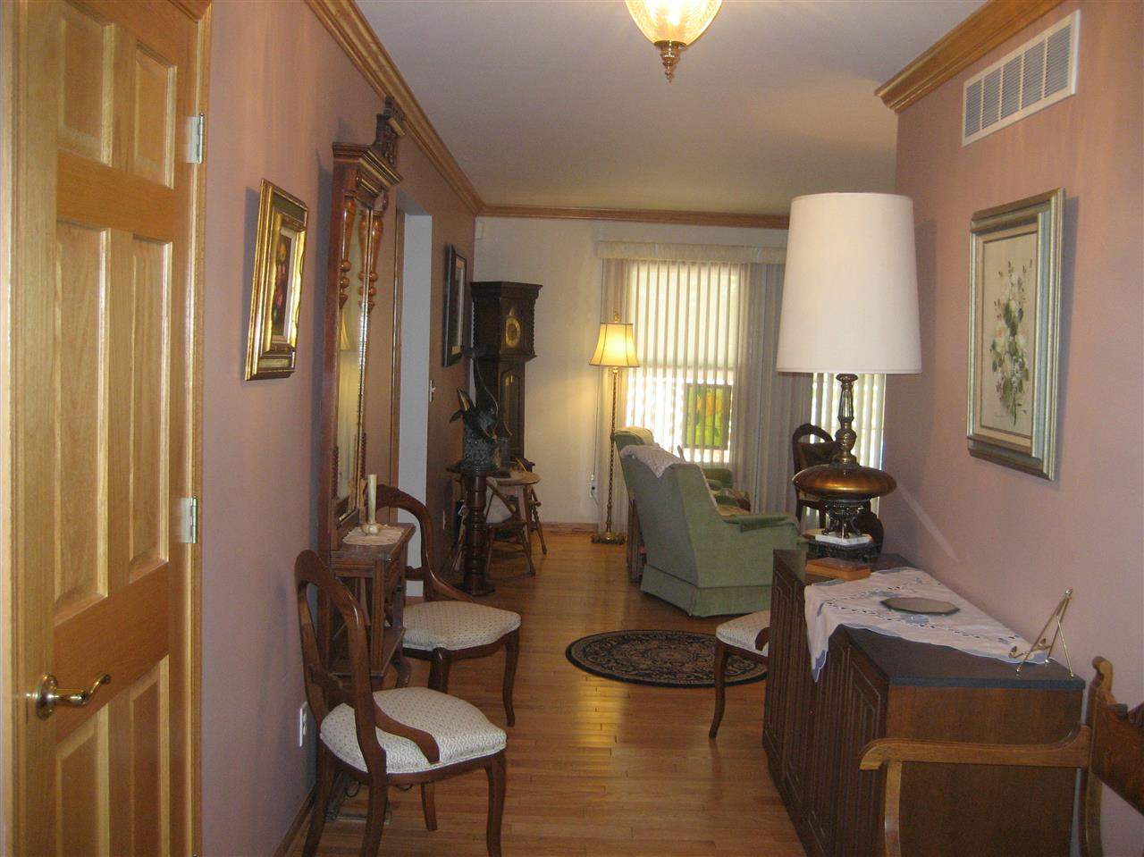2401 South Watertown Road Oregon, IL 61061 - Photo 12 of 24 a view of a livingroom with furniture and a window