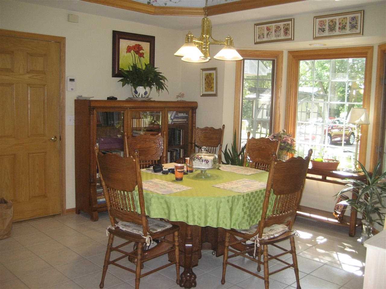2401 South Watertown Road Oregon, IL 61061 - Photo 16 of 24 a view of a dining room with furniture window and outside view
