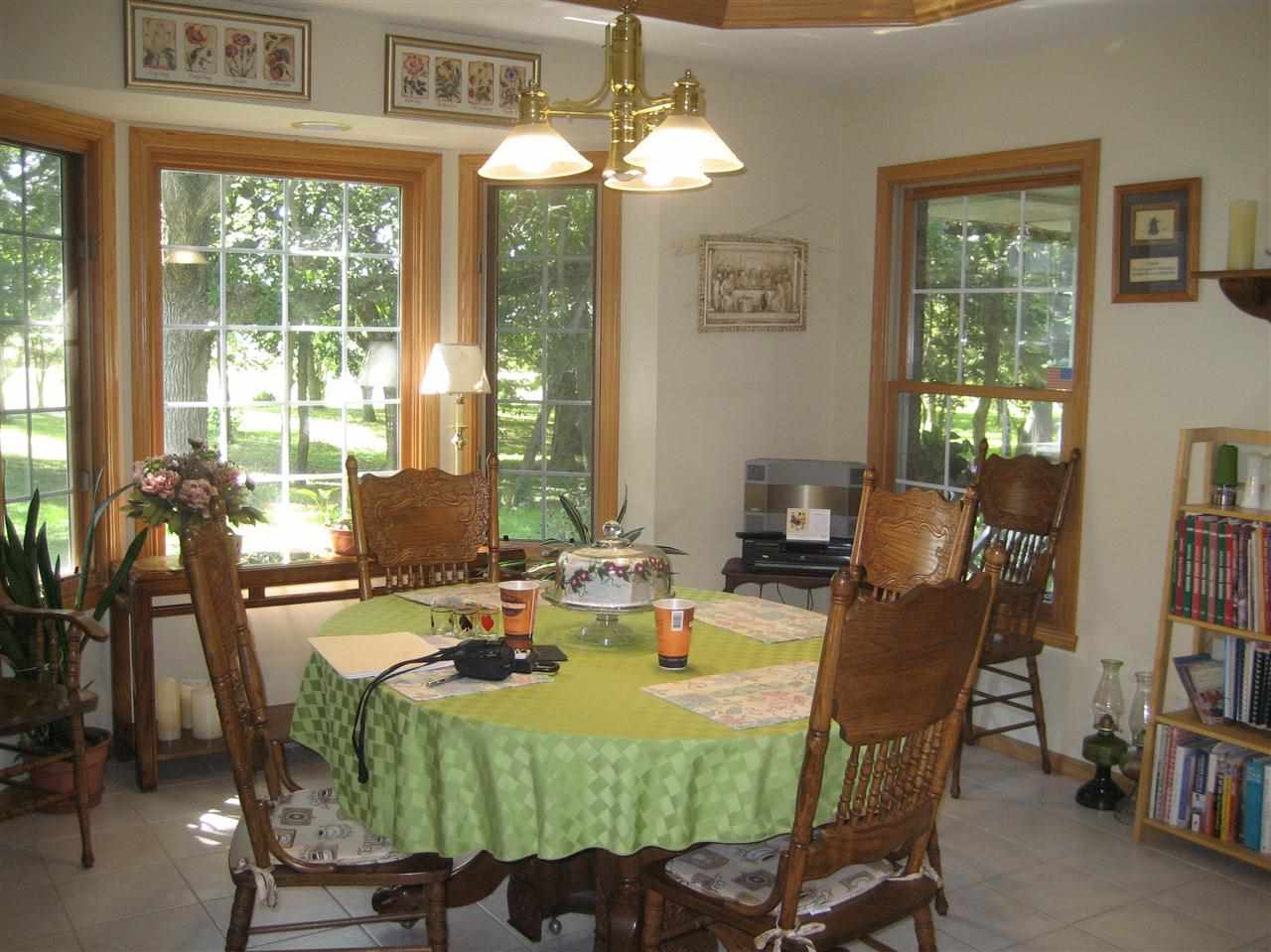 2401 South Watertown Road Oregon, IL 61061 - Photo 17 of 24 a view of a dining room with furniture window and outside view