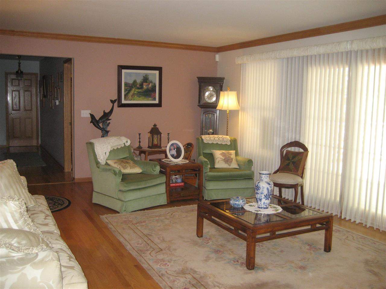 2401 South Watertown Road Oregon, IL 61061 - Photo 2 of 24 a living room with furniture and a window