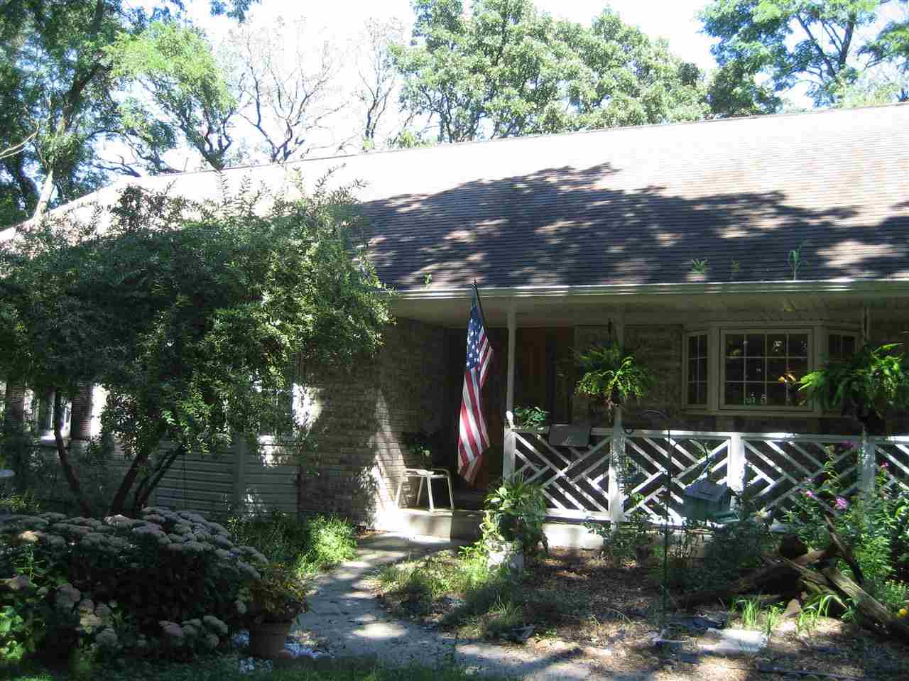 2401 South Watertown Road Oregon, IL 61061 - Photo 22 of 24 a view of a house with tree s