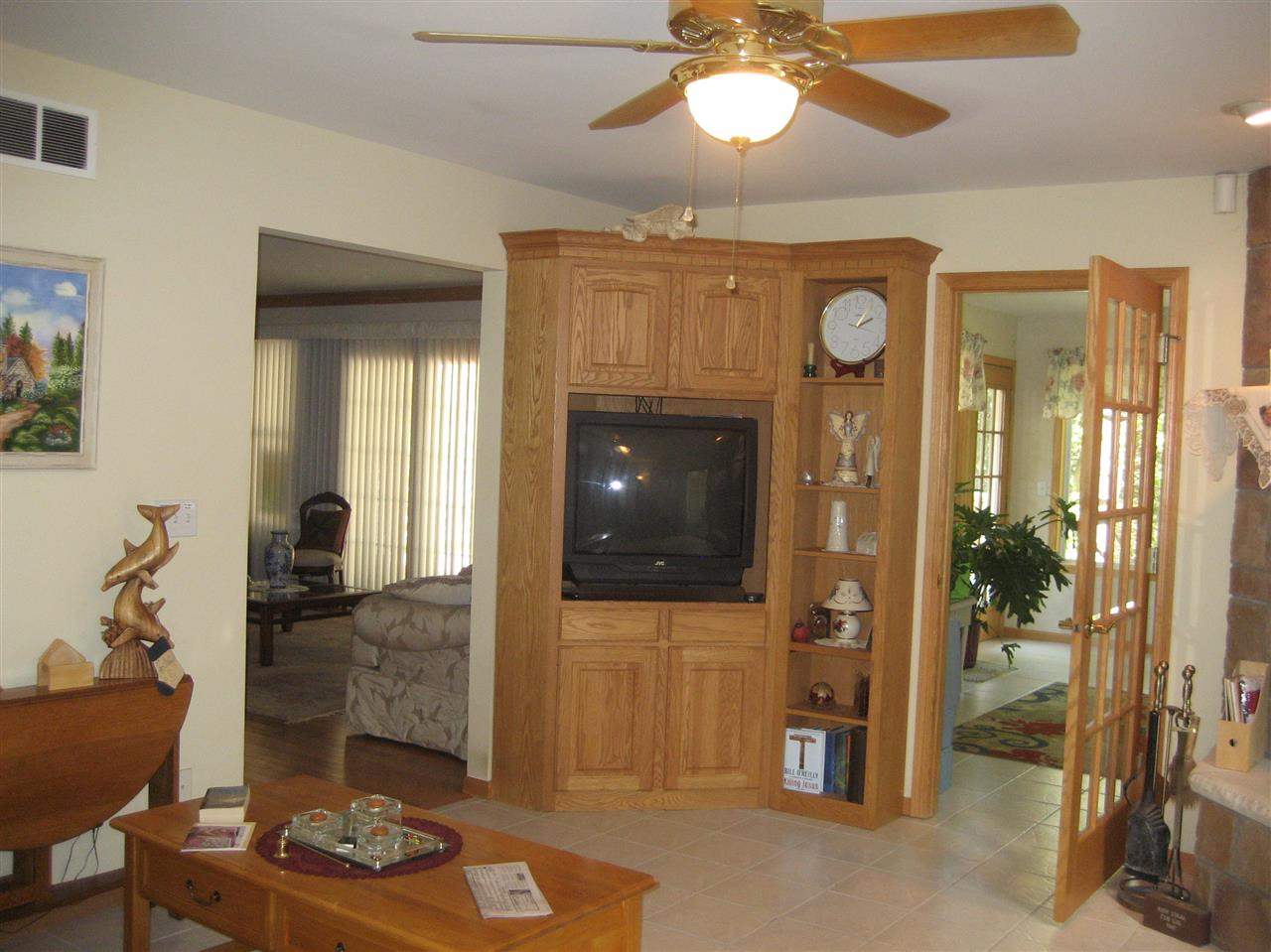 2401 South Watertown Road Oregon, IL 61061 - Photo 3 of 24 a living room with furniture and a fireplace