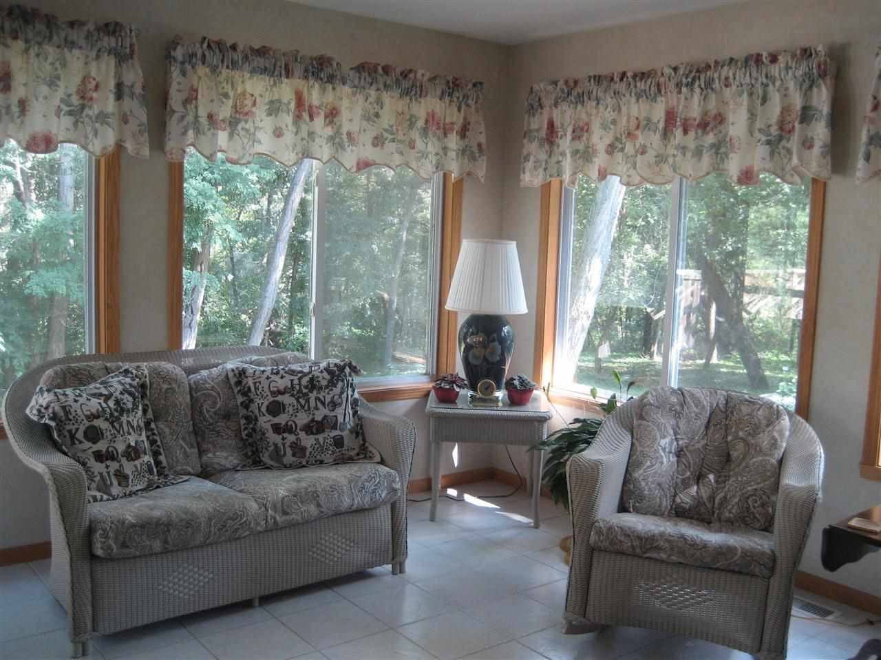 2401 South Watertown Road Oregon, IL 61061 - Photo 4 of 24 a living room with furniture and a large window