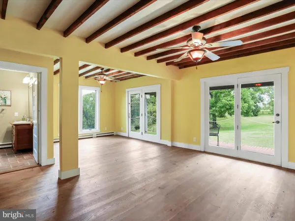 a kitchen with stainless steel appliances granite countertop a stove refrigerator and cabinets