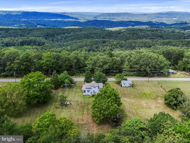 a view of porch with two chairs