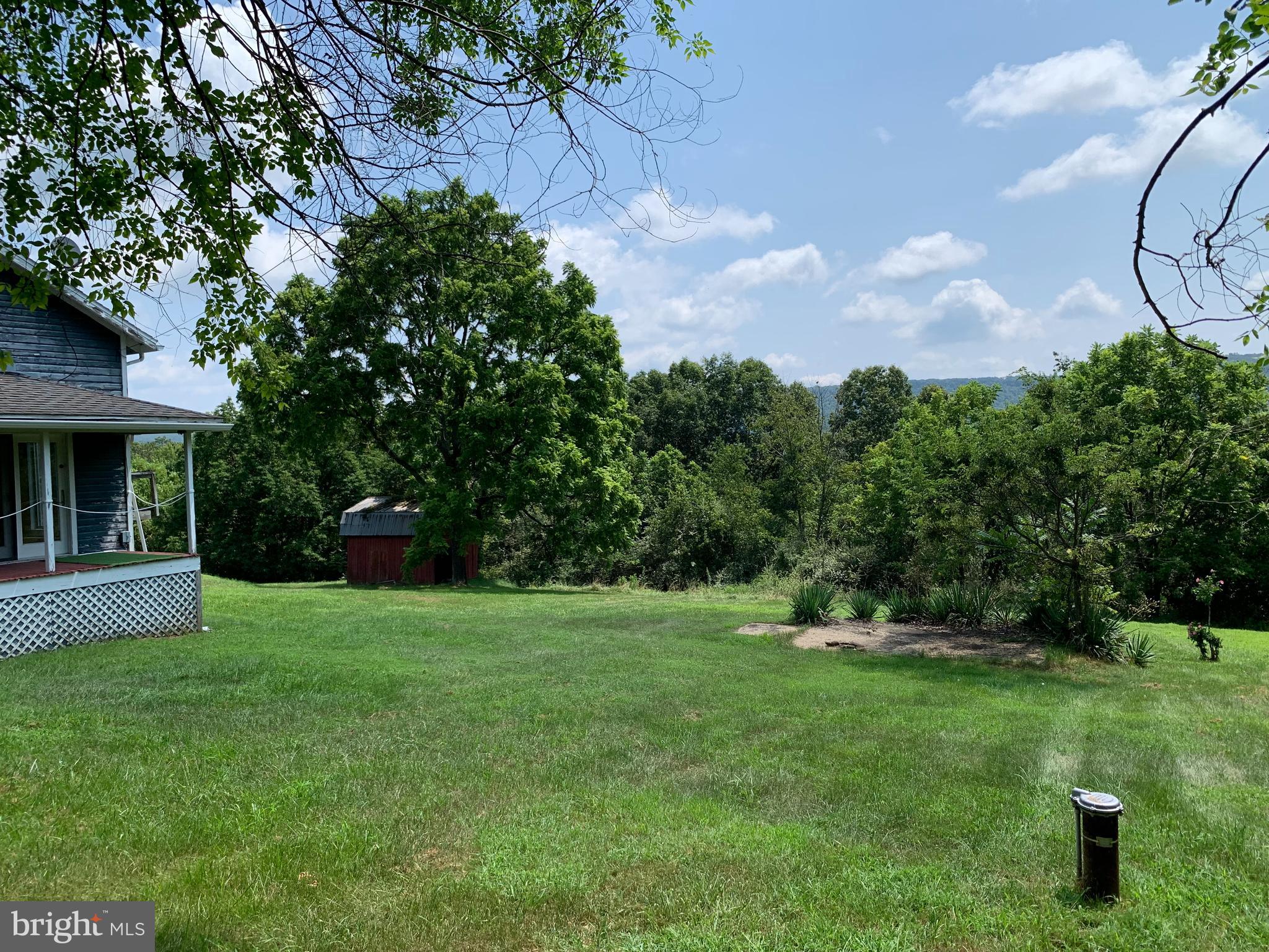 13108 Green Ridge Road Northeast Flintstone, MD 21530 - Photo 47 of 68 Right Side Yard - well on right