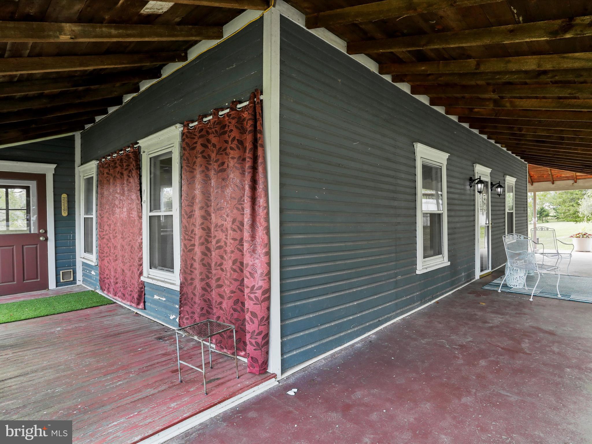 13108 Green Ridge Road Northeast Flintstone, MD 21530 - Photo 6 of 68 Left side porch to mud rm & front porch