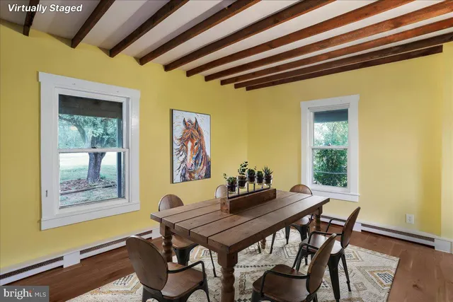 a table and chairs in a kitchen