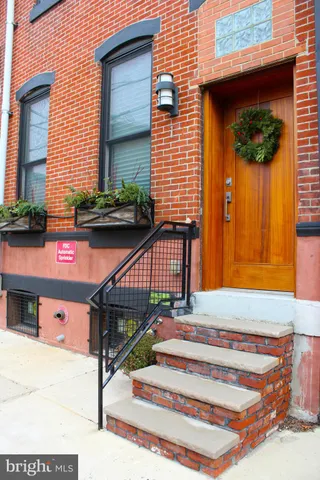 a front view of a house with a garage