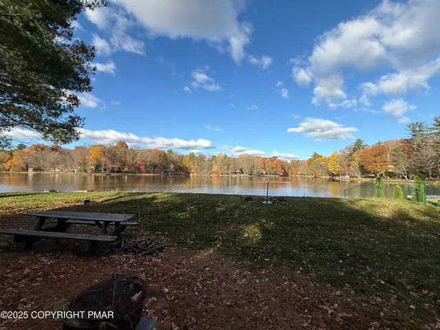 a view of lake with mountain