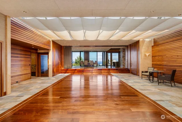 a view of indoor pool and dining room