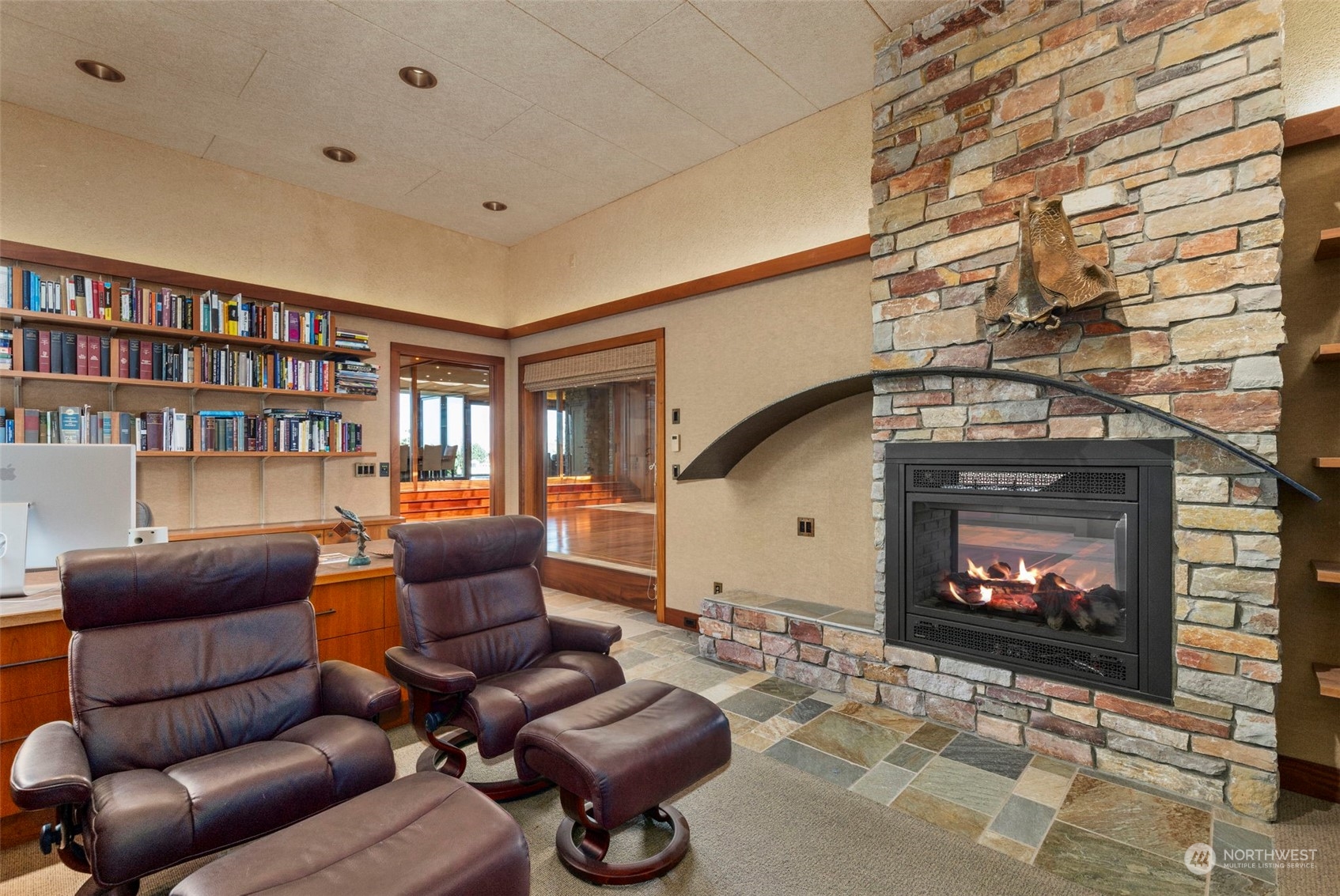 537 Jackson Street Port Townsend, WA 98368 - Photo 9 of 39 a living room with furniture and a fireplace
