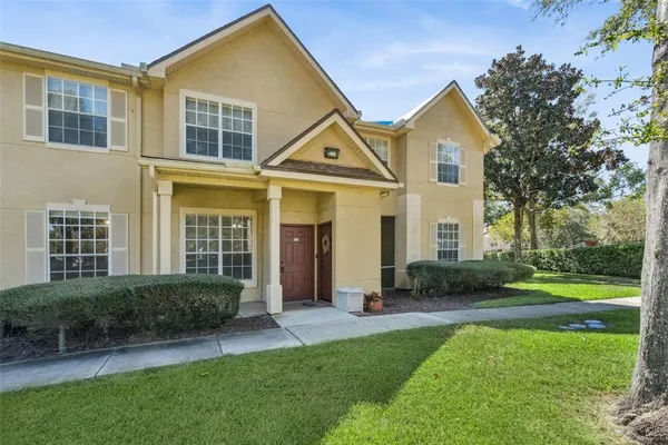 front view of a house with a yard