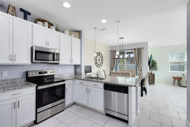 a bedroom with a bed and a table in it