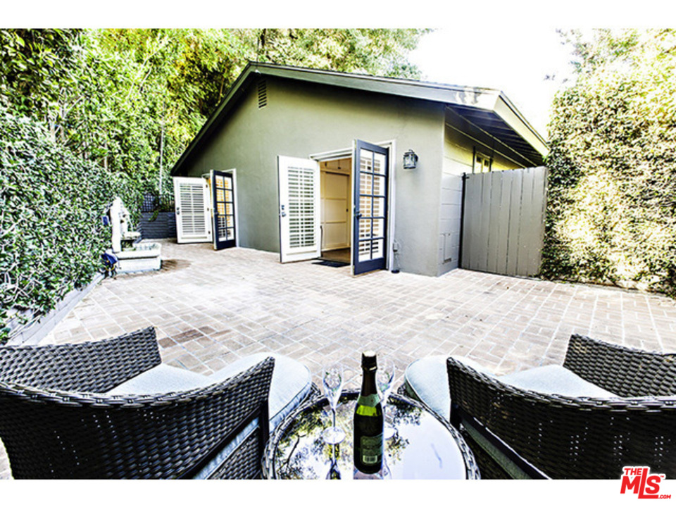 2559 Hutton Drive Beverly Hills, CA 90210 - Photo 11 of 13 a backyard of a house with barbeque oven