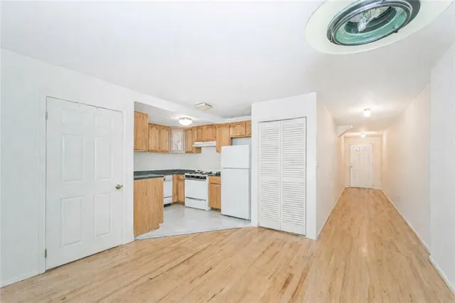 a view of a kitchen with a sink