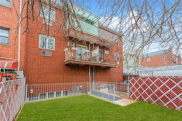 a view of a house with a large window