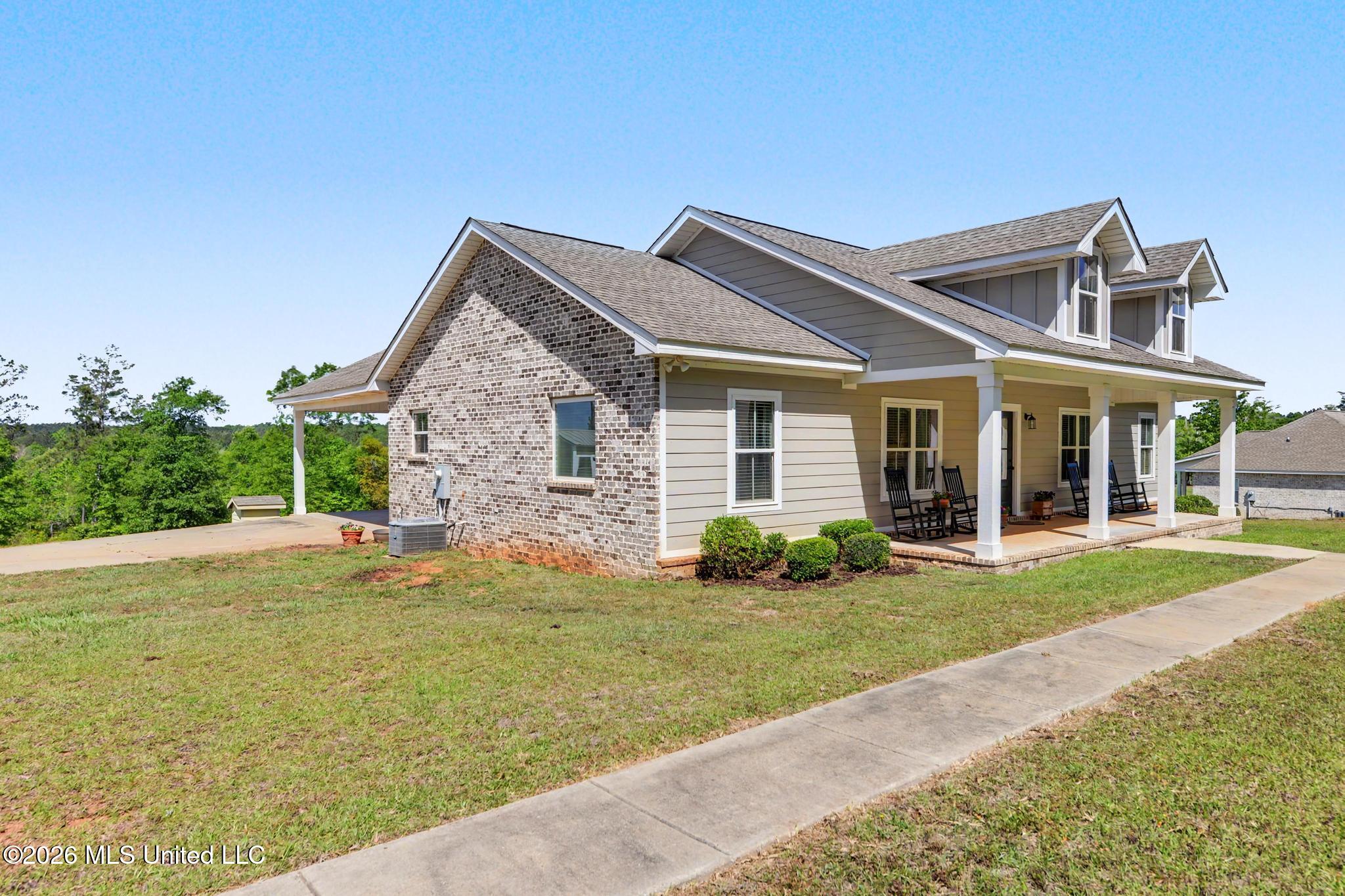 140 Leslie Williams Road Lucedale, MS 39452 - Photo 2 of 29 front/side