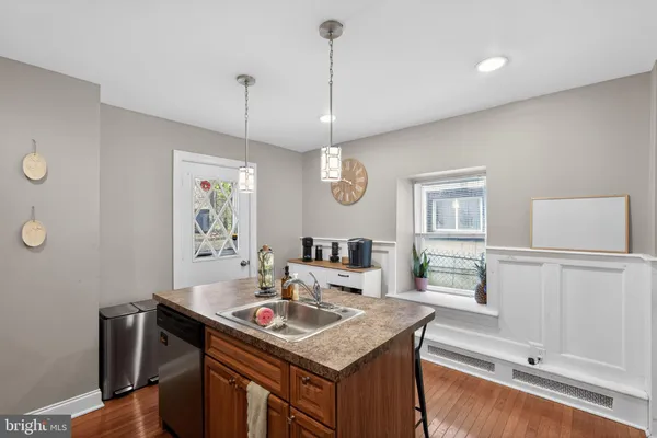 a view of a kitchen area with furniture and window