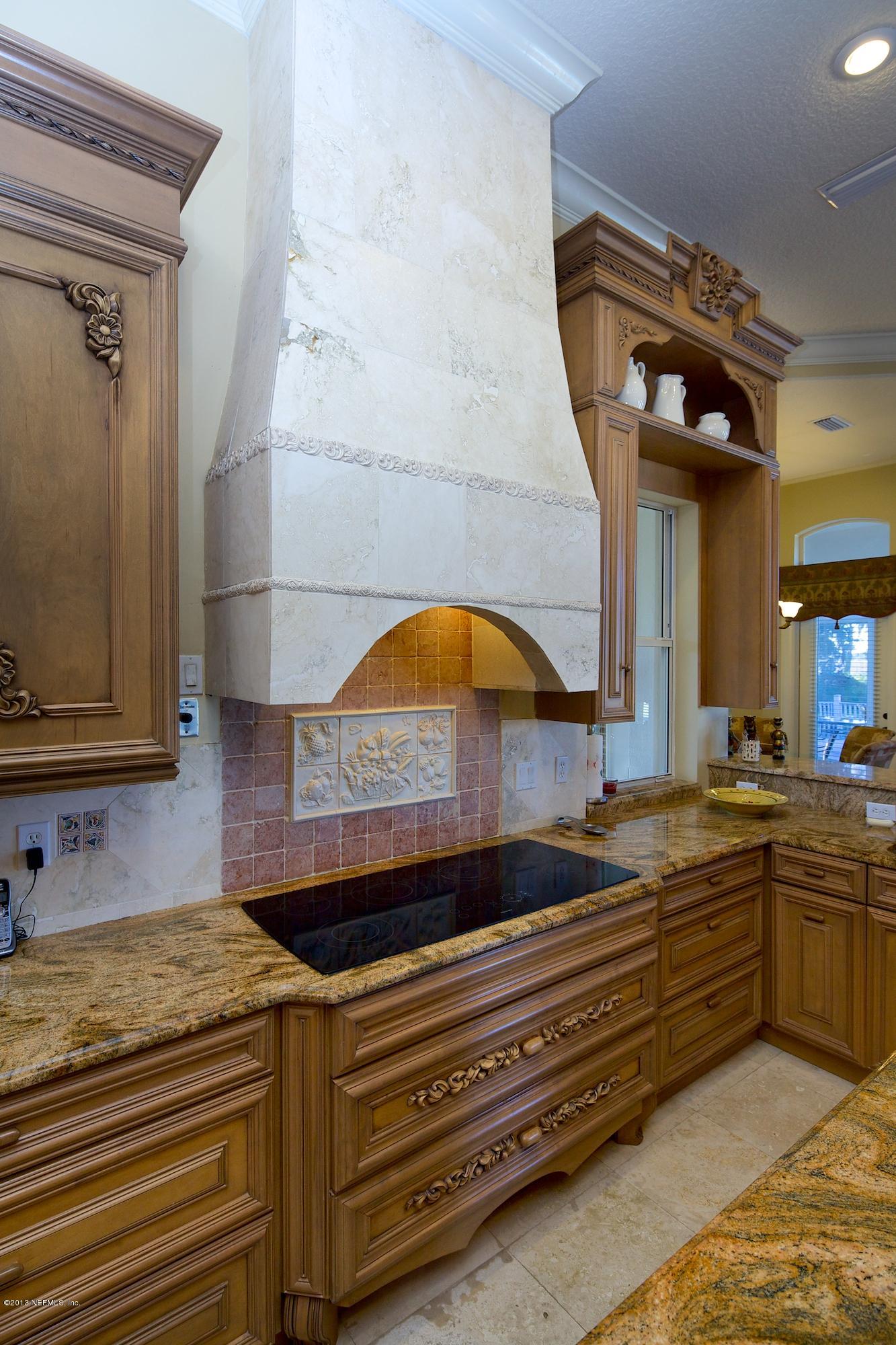 12946 Mandarin Road Jacksonville, FL 32223 - Photo 18 of 67 a bathroom with a sink and a mirror