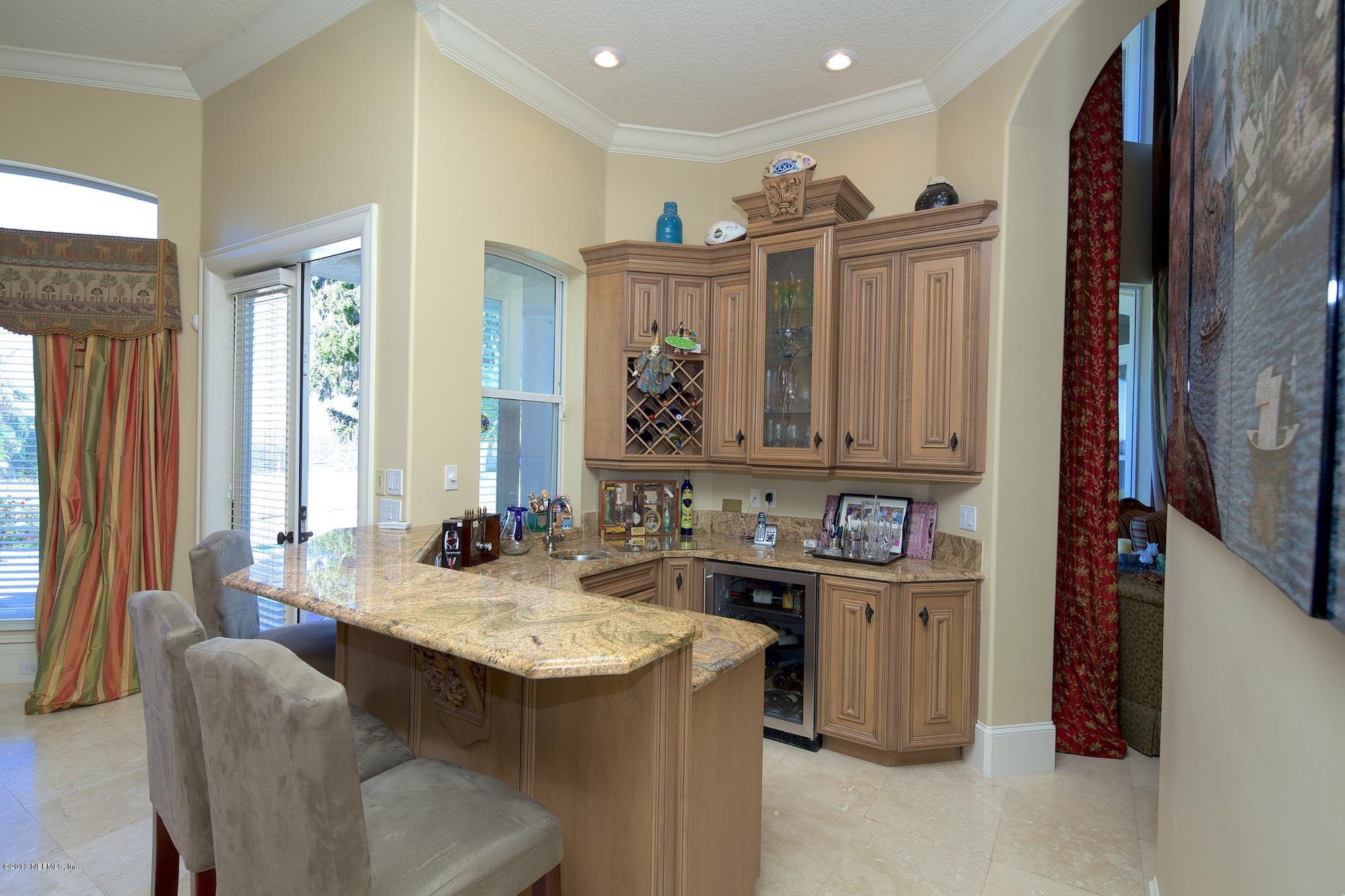 12946 Mandarin Road Jacksonville, FL 32223 - Photo 22 of 67 a view of a kitchen area with furniture and window