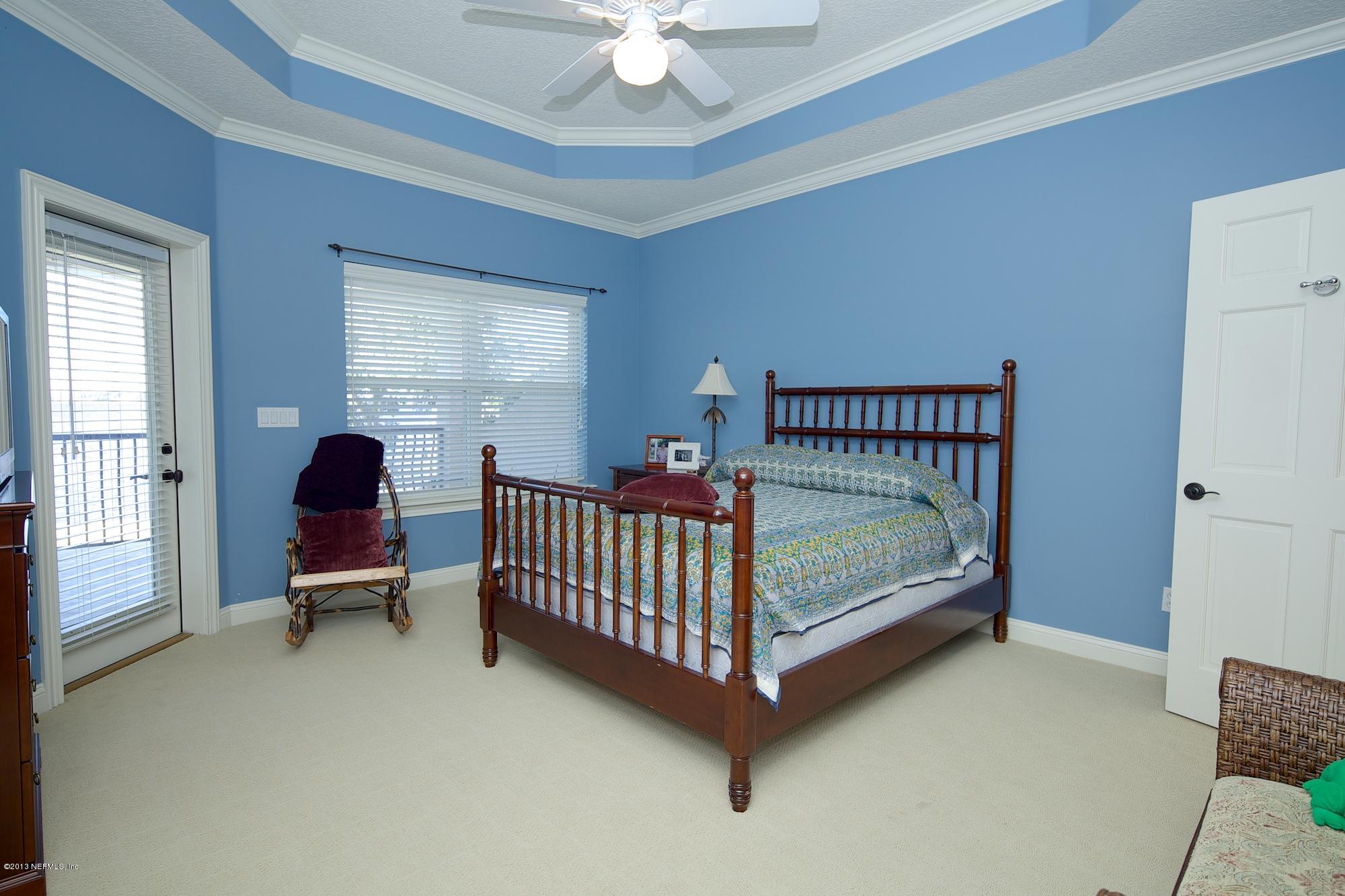 12946 Mandarin Road Jacksonville, FL 32223 - Photo 40 of 67 a bedroom with a bed and window