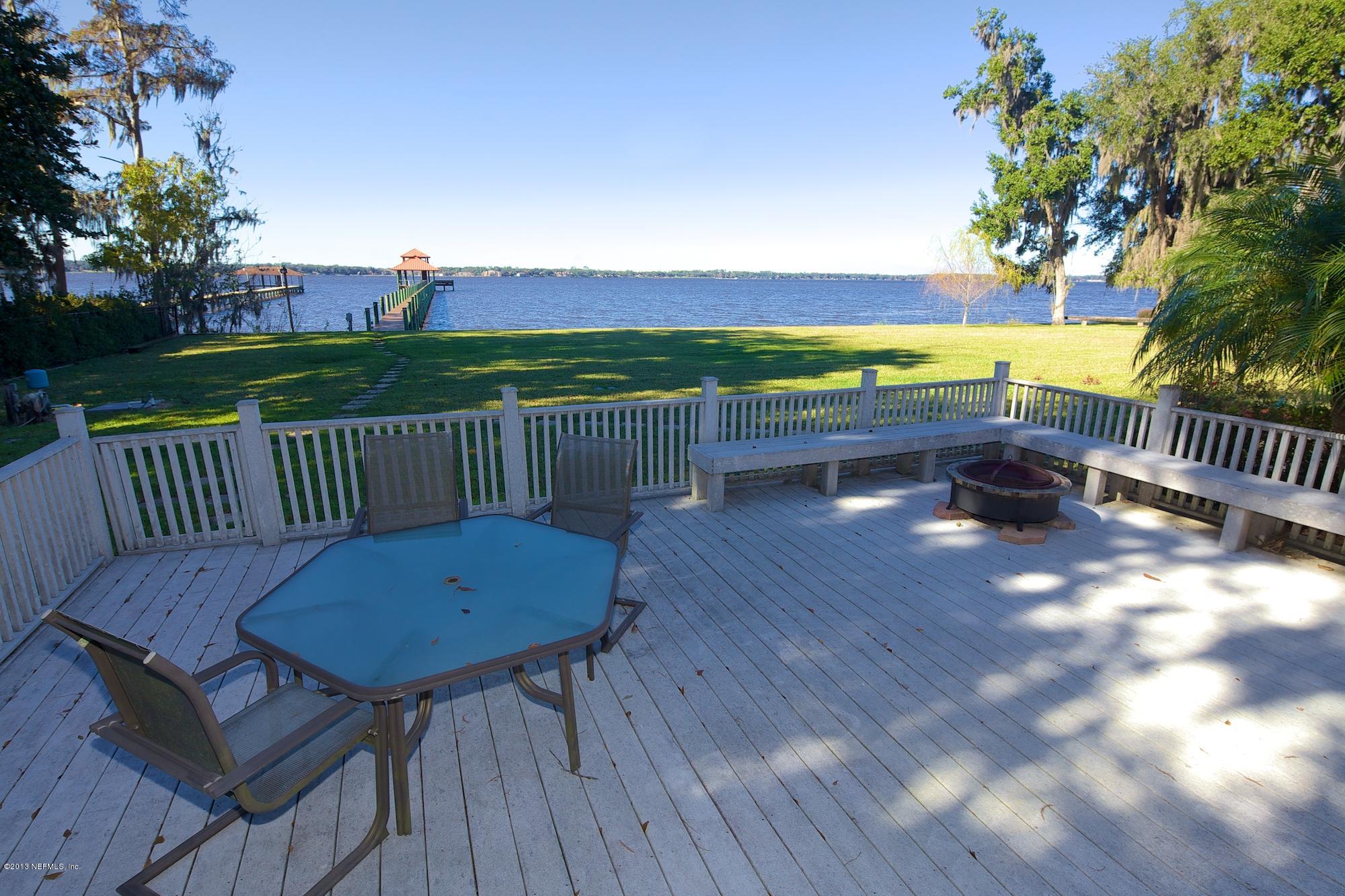 12946 Mandarin Road Jacksonville, FL 32223 - Photo 54 of 67 a view of a chair and table on the deck