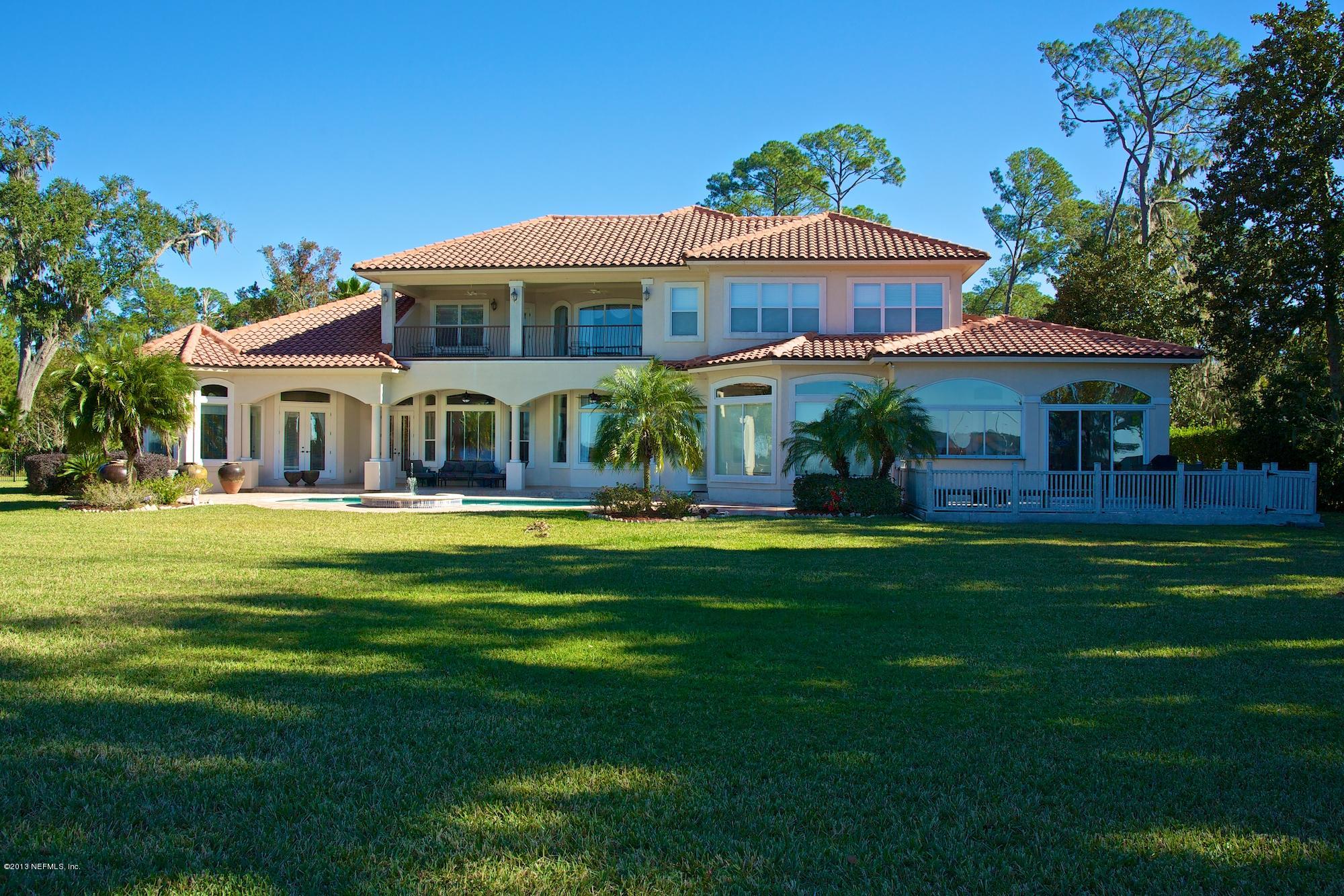 12946 Mandarin Road Jacksonville, FL 32223 - Photo 55 of 67 a front view of a house with a garden
