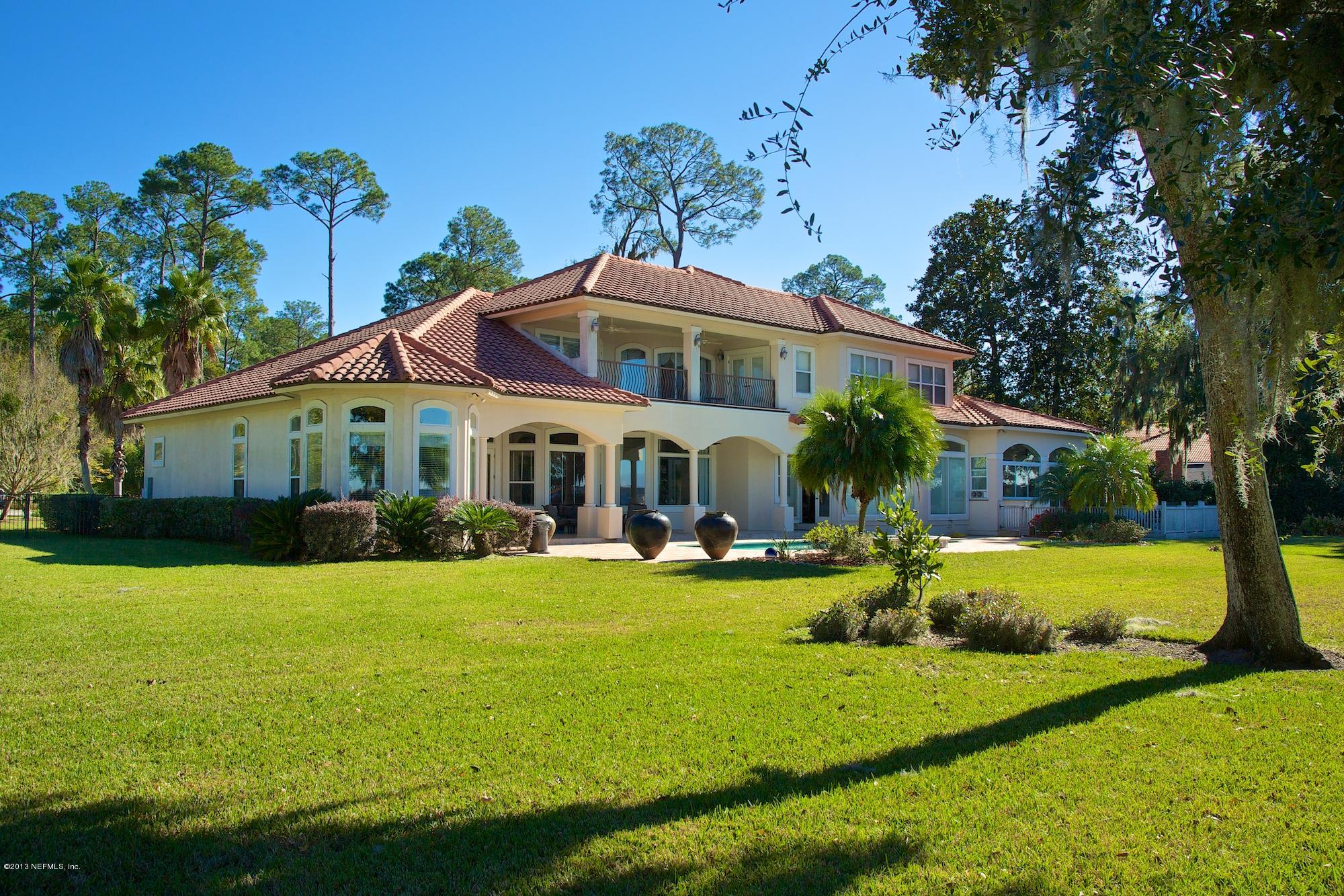 12946 Mandarin Road Jacksonville, FL 32223 - Photo 65 of 67 a front view of a house with garden