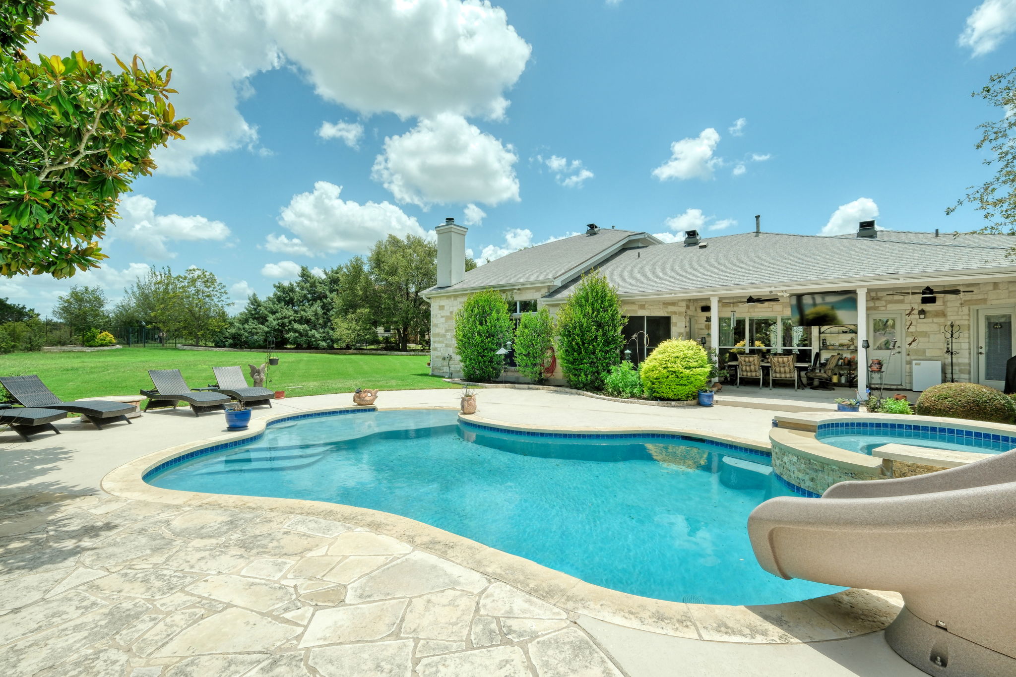 1601 Coronado Leander, TX 78641 - Photo 31 of 37 a view of a house with swimming pool and a yard