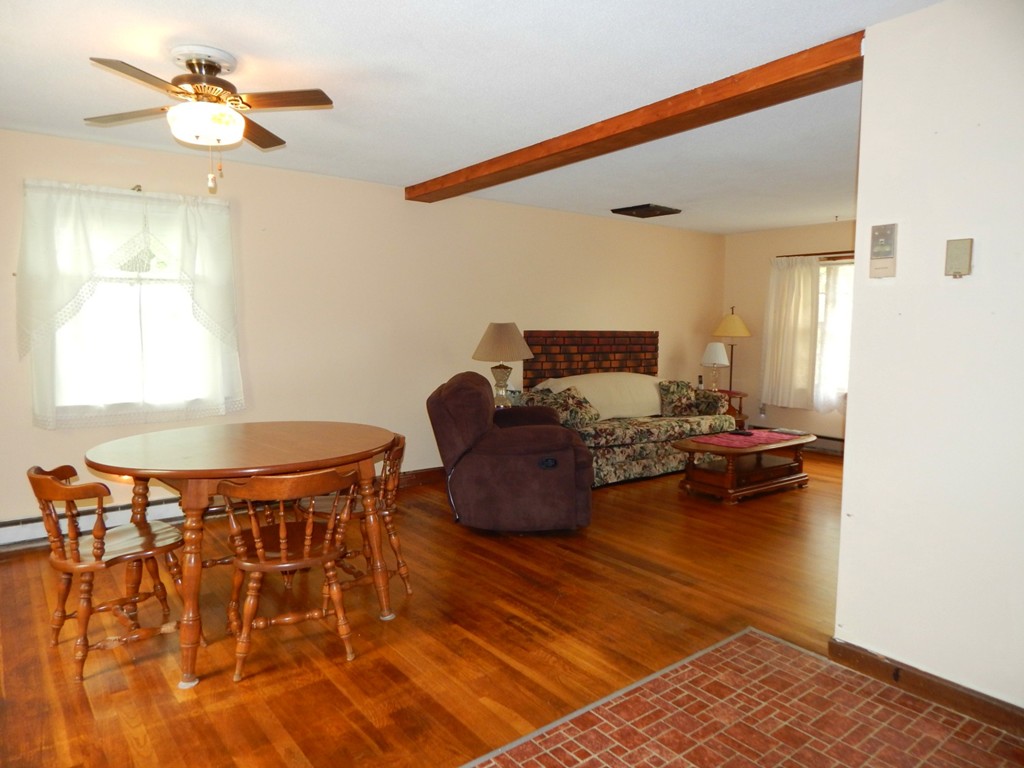 174 Ayer Road Shirley, MA 01464 - Photo 5 of 30 a living room with furniture and a wooden floor