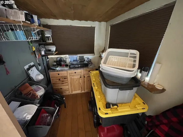 a view of workspace with wooden closet