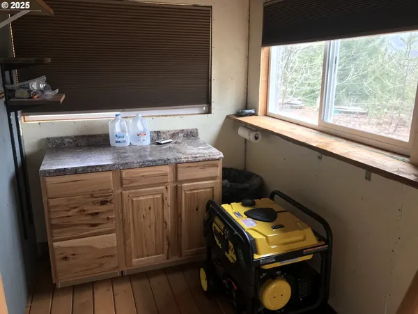 a utility room with washer and dryer