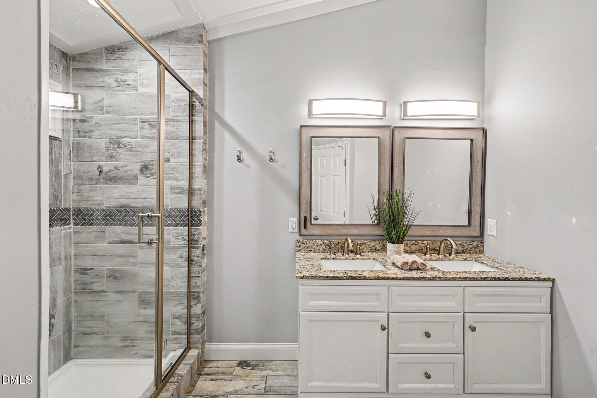 7704 Zebulon Road Youngsville, NC 27596 - Photo 22 of 41 Owner's Bath renovated