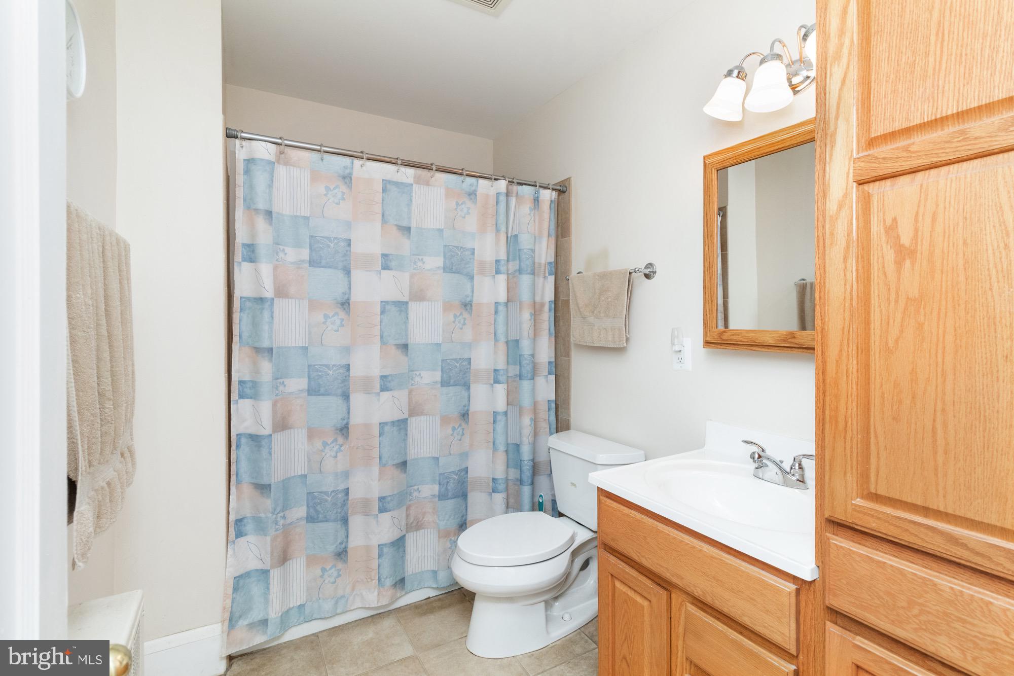 4305 Fullerton Avenue Baltimore, MD 21206 - Photo 15 of 36 a bathroom with a sink toilet and shower