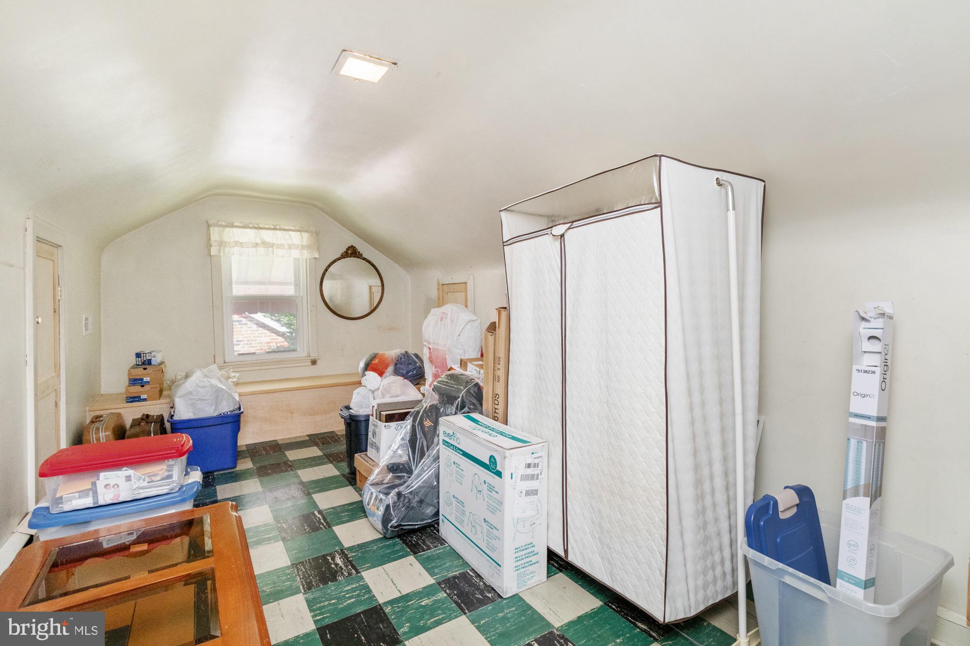 4305 Fullerton Avenue Baltimore, MD 21206 - Photo 21 of 36 a very nice looking room with many windows and furniture