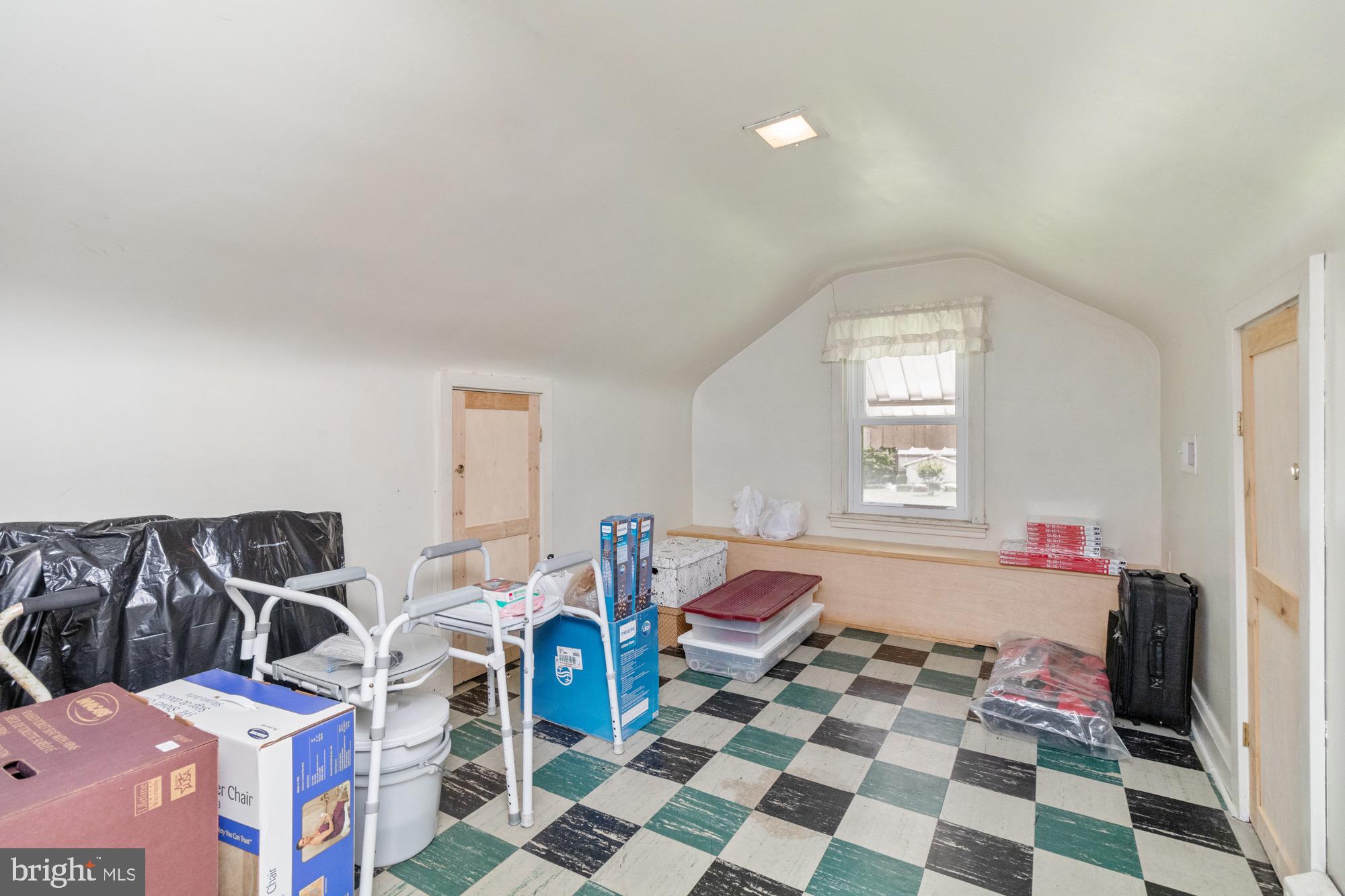 4305 Fullerton Avenue Baltimore, MD 21206 - Photo 22 of 36 a living room with furniture and a window