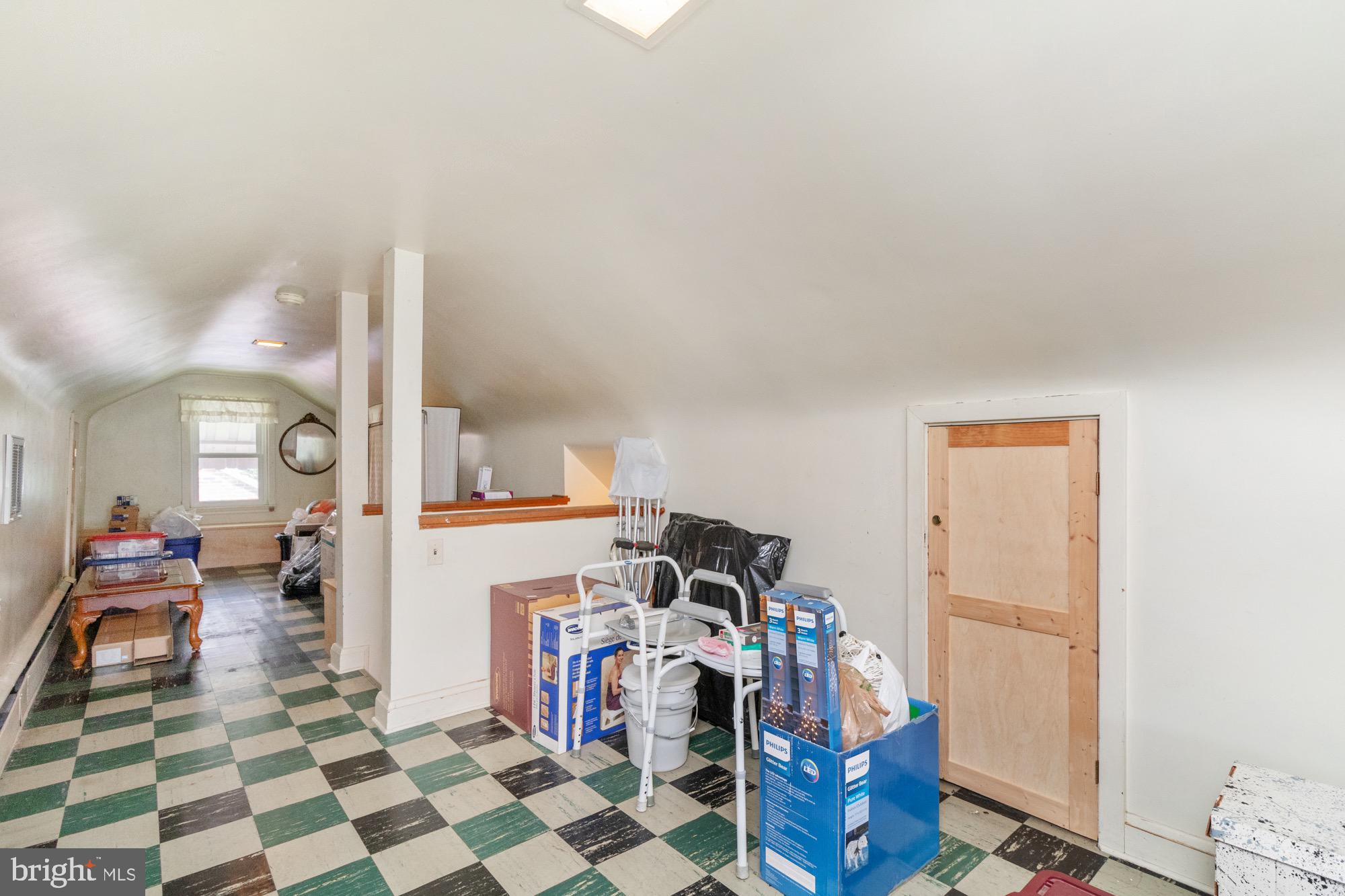 4305 Fullerton Avenue Baltimore, MD 21206 - Photo 23 of 36 a room with furniture and a view of bedroom